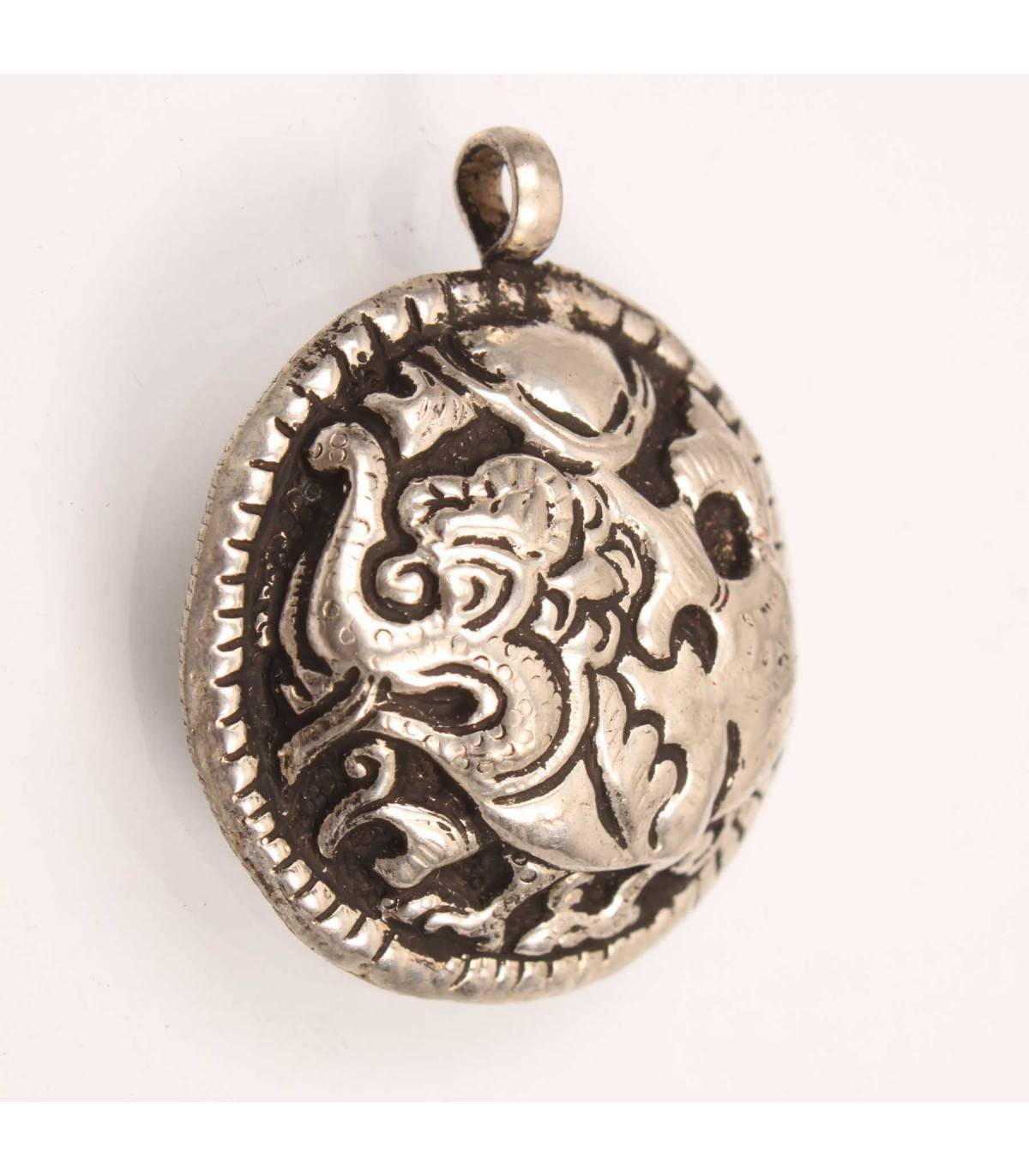 Embossed Dragon Emitting Pendent| Pendent From Nepal Online